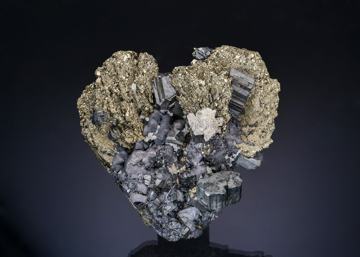 BOURNONITE with GALENA and SPHALERITE on PYRITE ps. after PYRRHOTITE