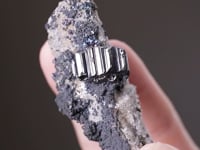 BOURNONITE with FREIBERGITE and PYRITE on  QUARTZ