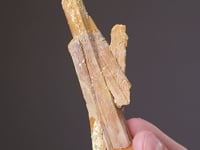 NATIVE SULPHUR   on STIBICONITE ps. after STIBNITE