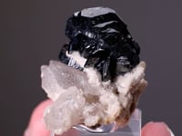 HEMATITE with RUTILE on QUARTZ