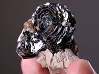 HEMATITE   on ALBITE