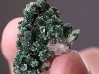 OLIVENITE   on QUARTZ