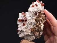 SPESSARTINE on Feldspar
