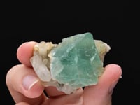 FLUORITE   on QUARTZ