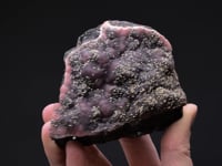 RHODOCHROSITE with PYRITE  on SPHALERITE