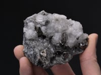 CARROLLITE with CHALCOPYRITE  on CALCITE