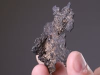 LUANHEITE   with EUGENITE