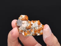 FLUORITE with SPESSARTINE on MICROCLINE